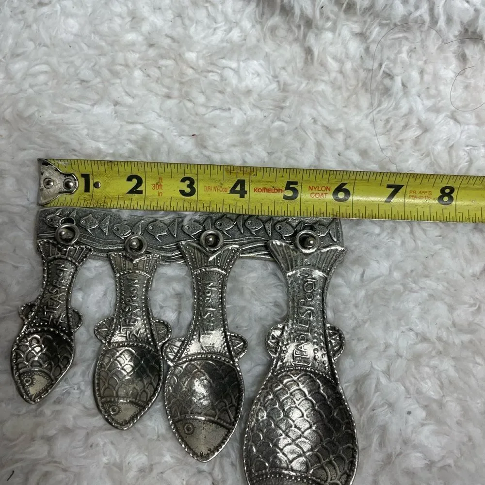 Vintage Tin Woodsman TWpewter set of four Fish measuring spoons with wall hanger